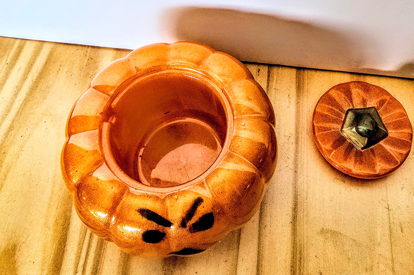 The Little Resin Pumpkin is a fun Halloween decoration measuring 4 by 3 inches.