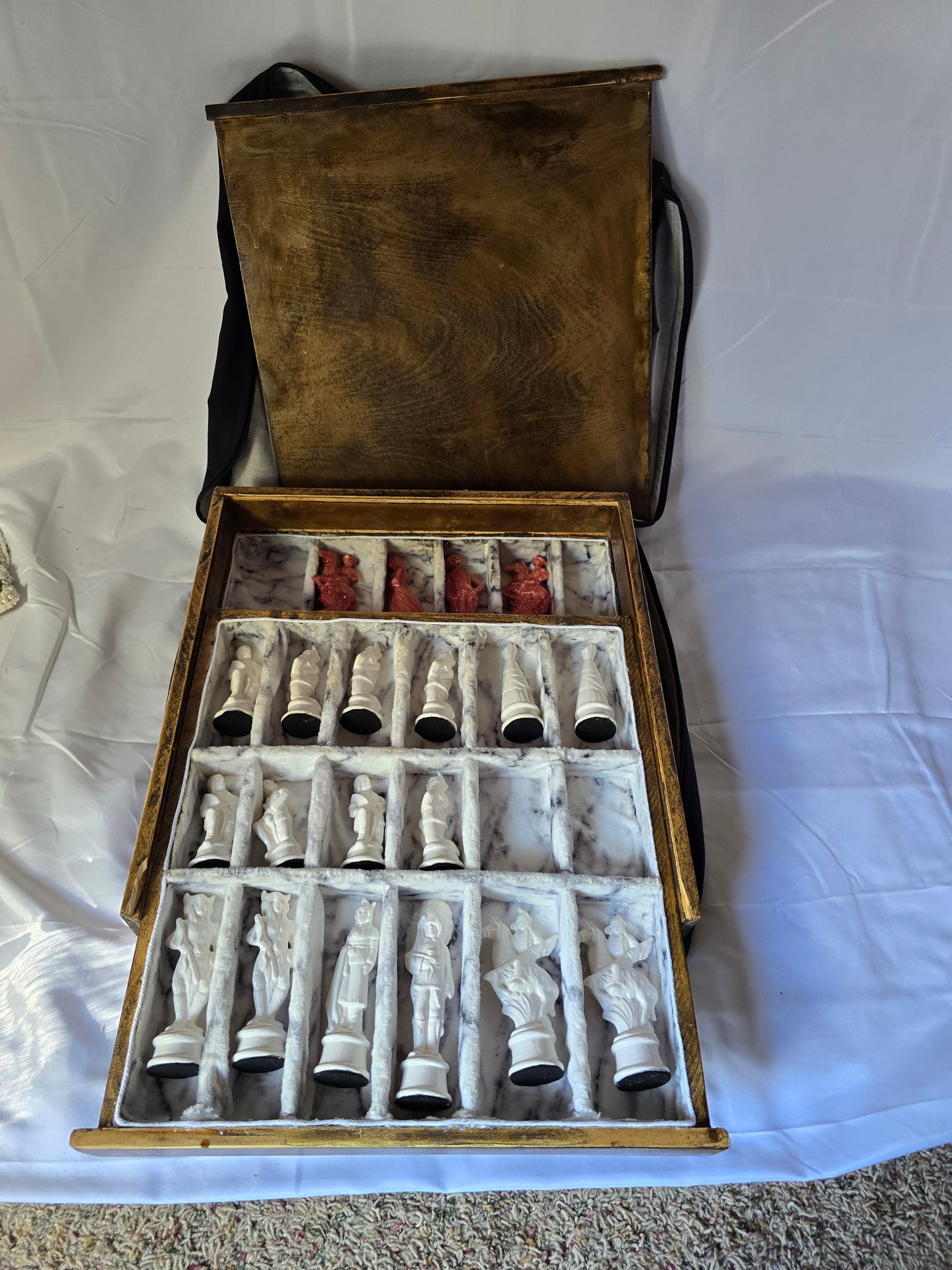 Wood and resin chess set with ceramic pieces. Red and white 18 by 18 inch board.