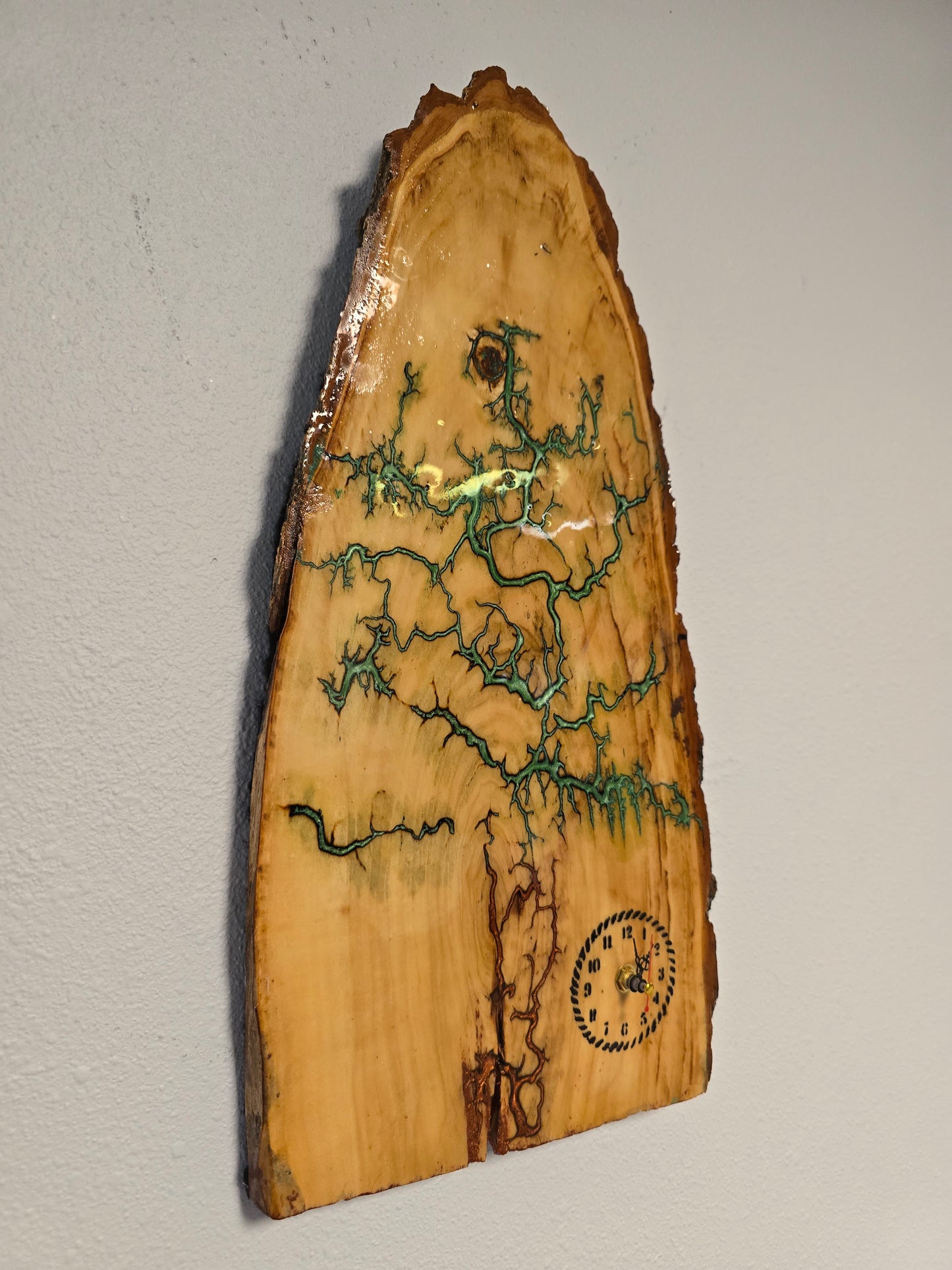 Wood And Resin Lickedenburg Burned Tree Clock. It's 19 By 9 By 1 Inch