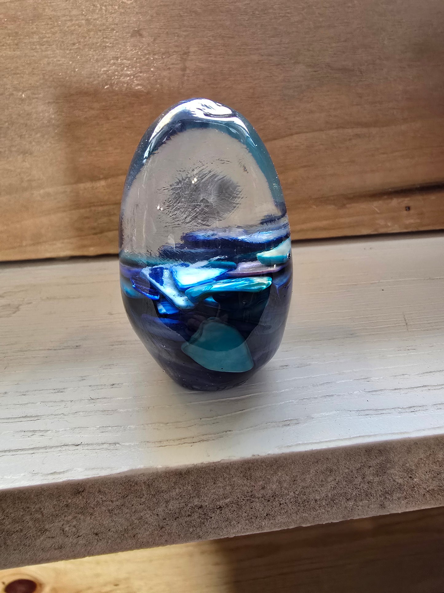 3 Inch Tall Resin Egg with Blue Rocks. Great Gift Idea