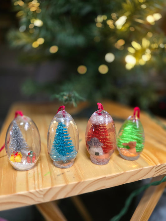 4 Christmas Ornaments 2 Are Mine Resin Snow Globes. They Are 1 By 3 Inches.