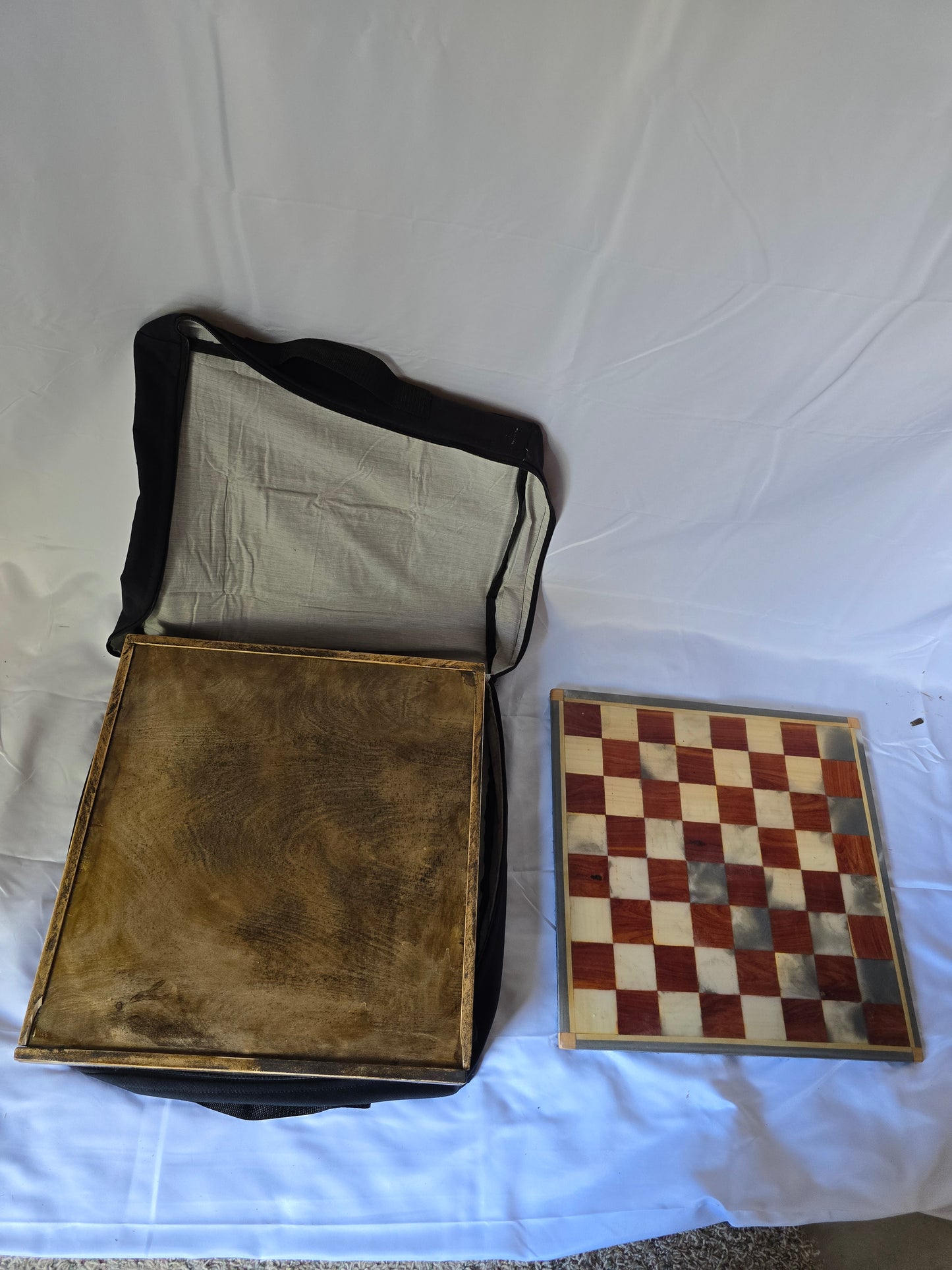 Wood and resin chess set with ceramic pieces. Red and white 18 by 18 inch board.