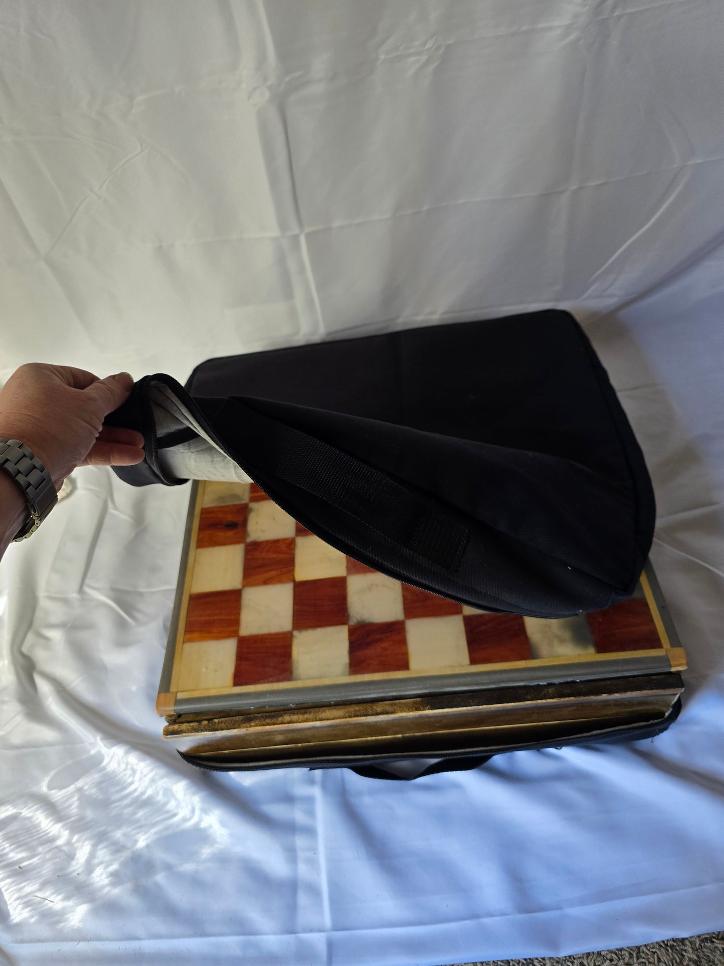 Wood and resin chess set with ceramic pieces. Red and white 18 by 18 inch board.