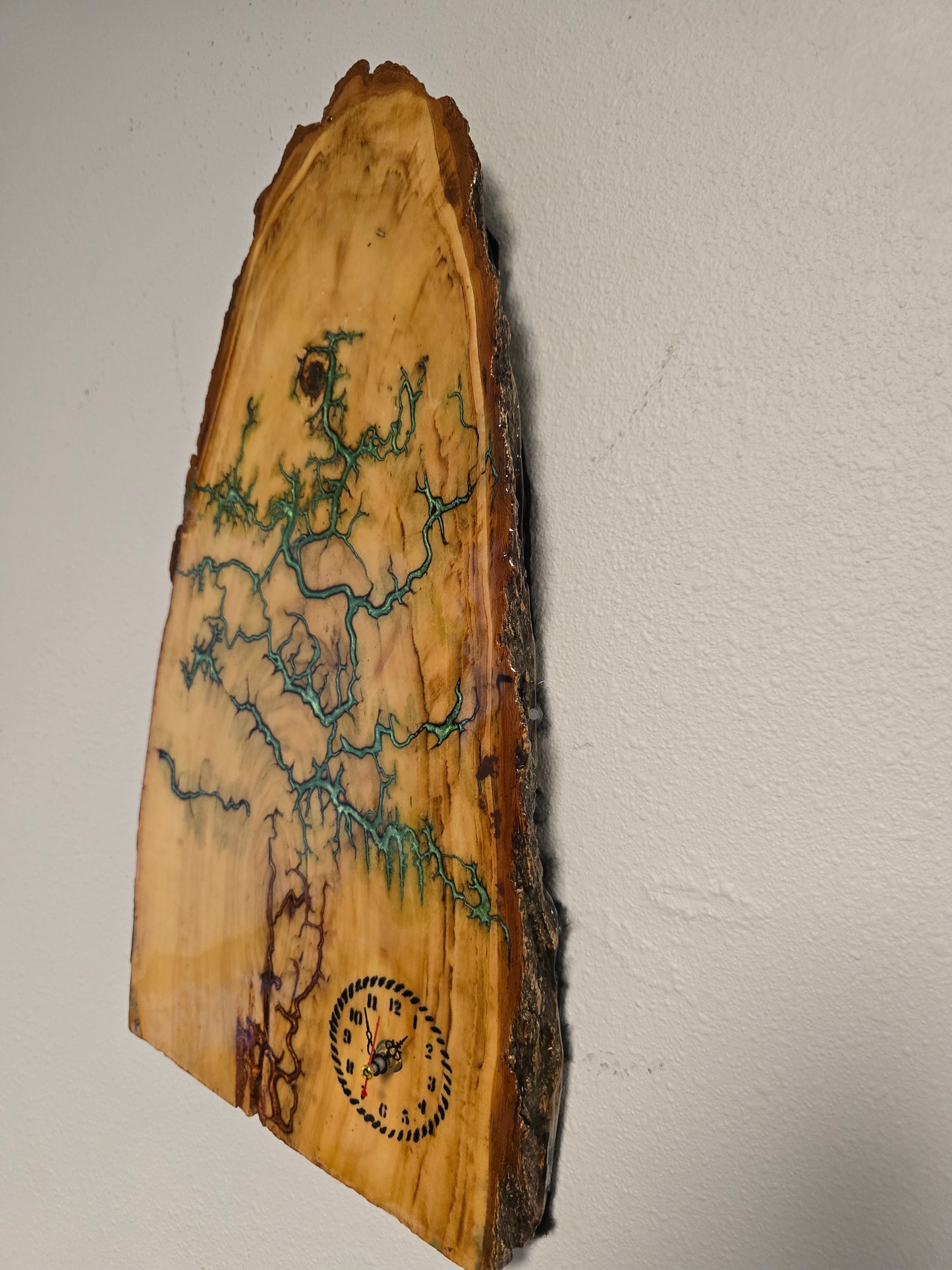 Wood And Resin Lickedenburg Burned Tree Clock. It's 19 By 9 By 1 Inch