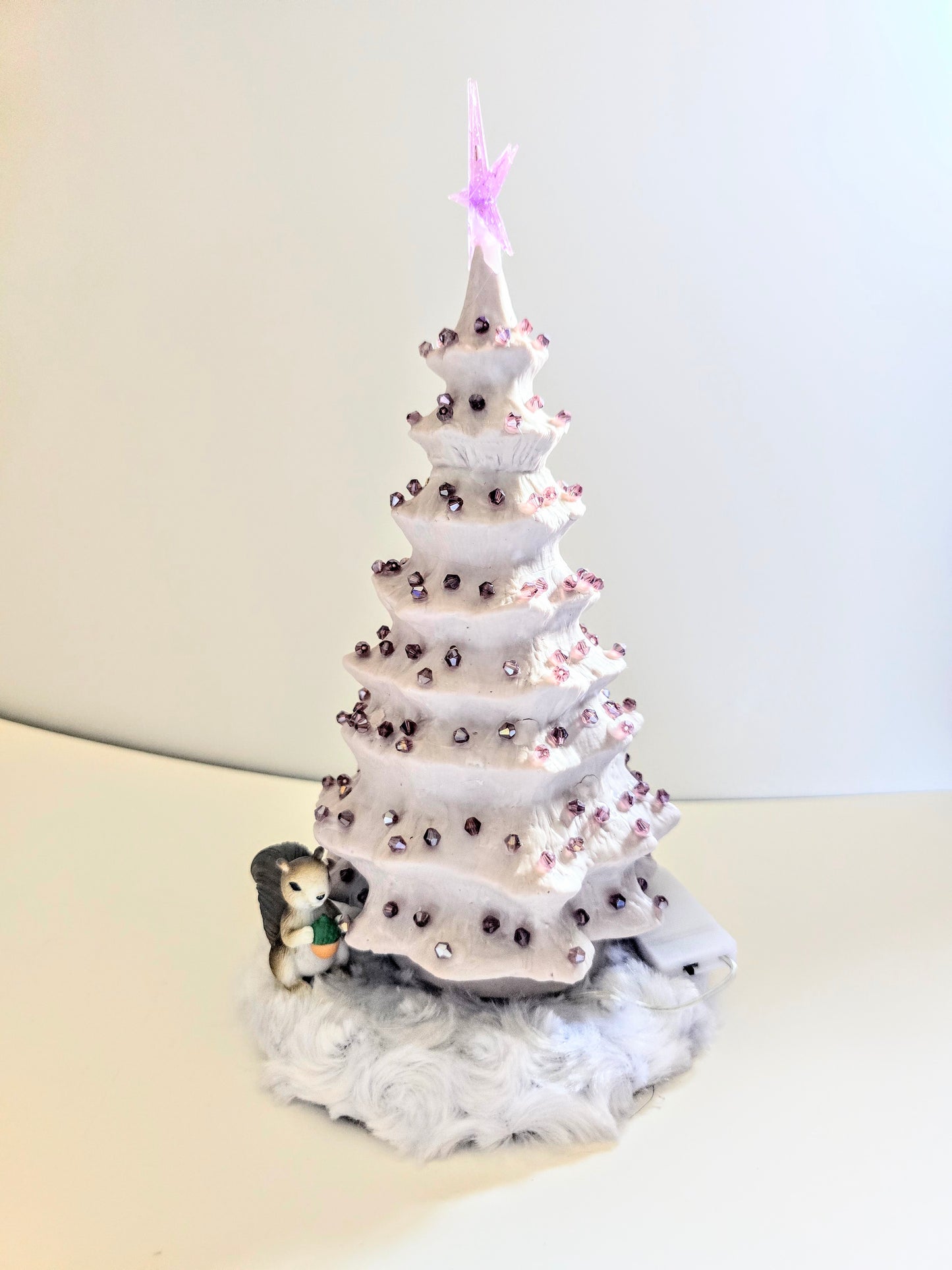 White Tree With Purple Lights, And Purple Beads.  It's 11 By 7 Inches