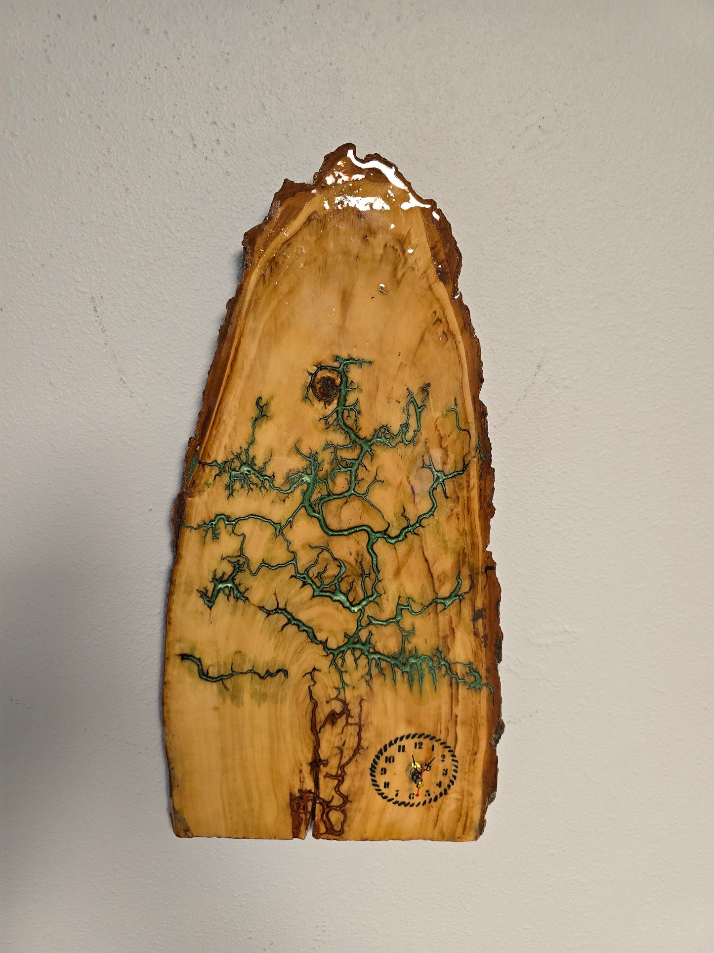 Wood And Resin Lickedenburg Burned Tree Clock. It's 19 By 9 By 1 Inch