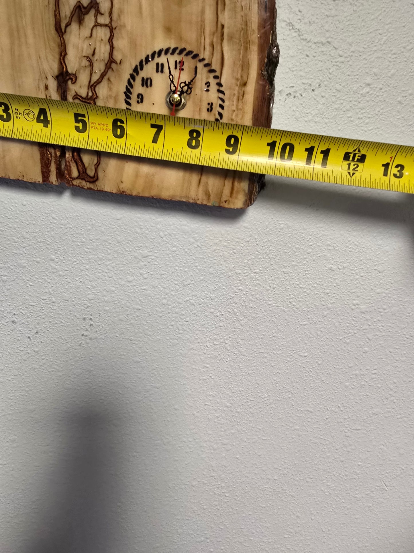 Wood And Resin Lickedenburg Burned Tree Clock. It's 19 By 9 By 1 Inch